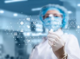 Doctor shows a pill on the background of the medical icons